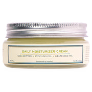 HMA Daily Moisturizer Cream with Shea Butter, Avocado Oil, and Grapeseed in a 1.41 oz jar with silver screw cap.